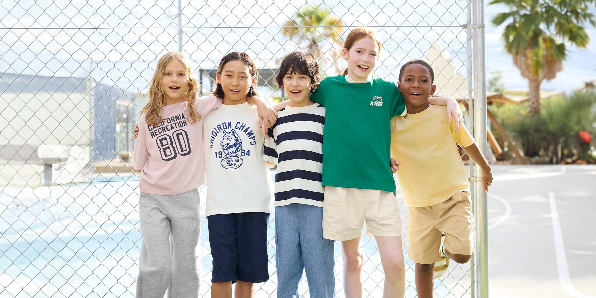group of five models wearing UNIQLO T-shirts