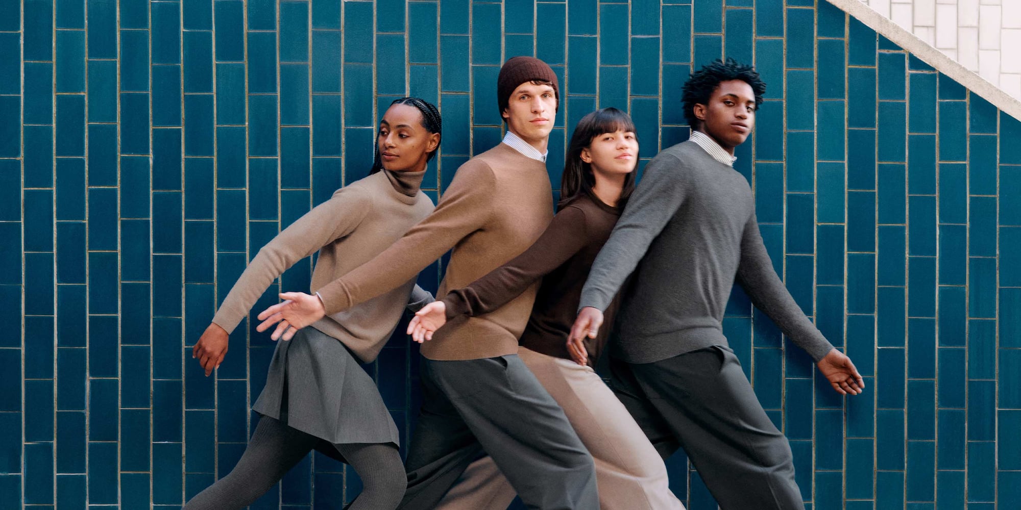 four models wearing uniqlo cashmere knitwear