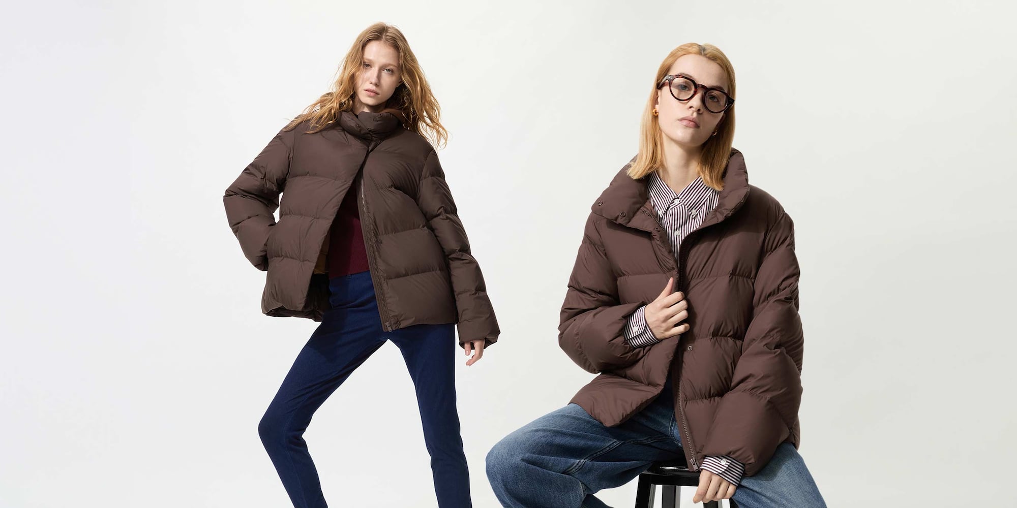 model wearing Powder Soft Down Jacket in brown with a striped shirt and jeans