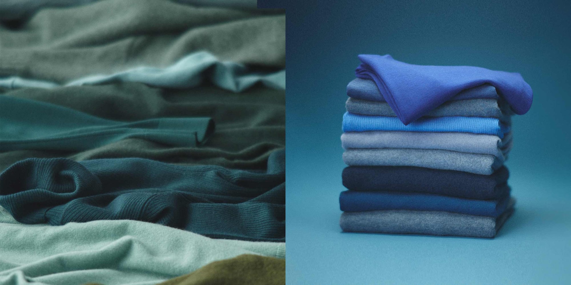 pile of folded jumpers in various shades of blue