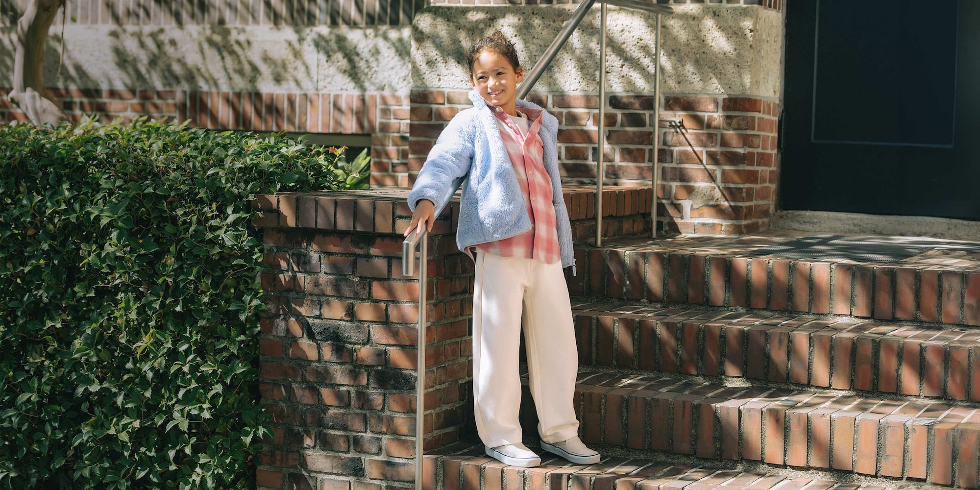 model wearing DRY Sweat Curve Trousers in off white with a pink checked shirt and light blue fleece