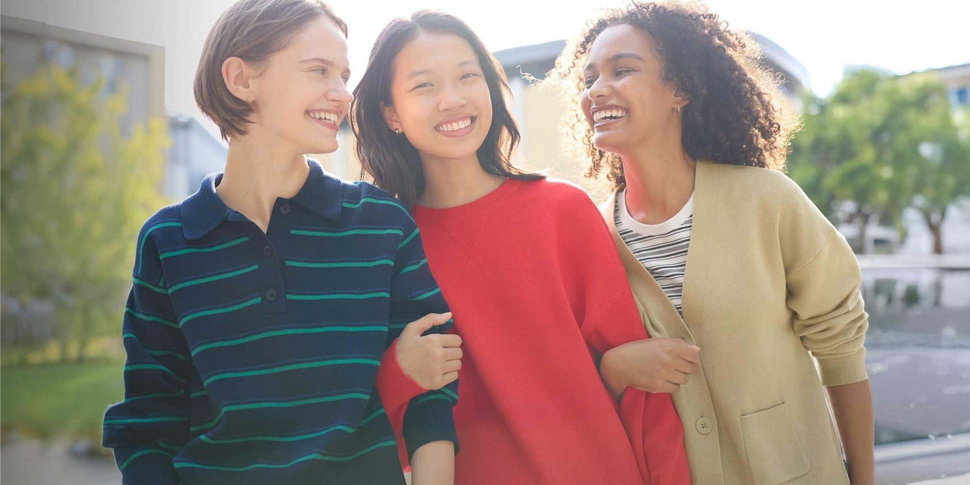 three models wearing UNIQLO spring knitwear