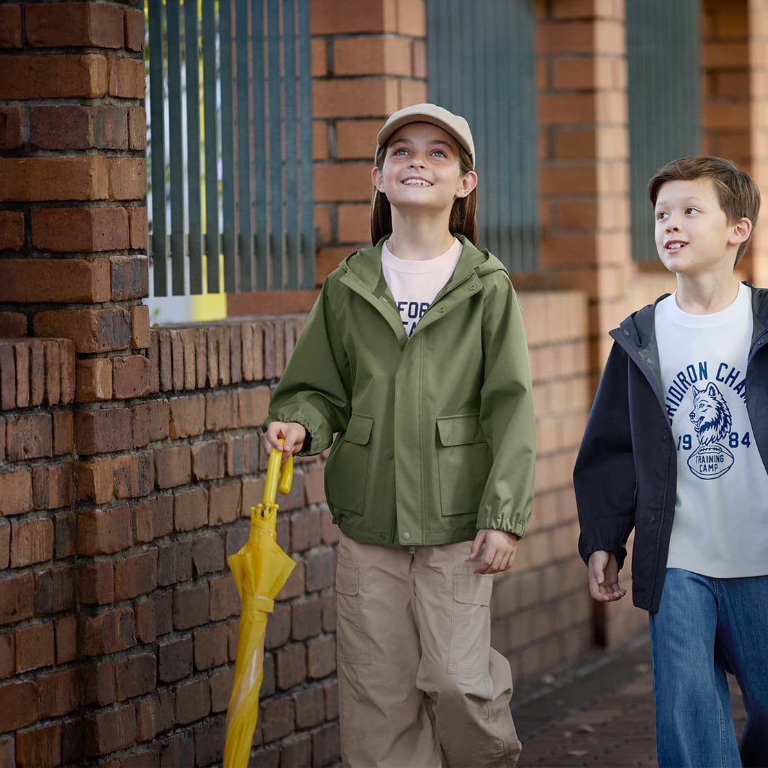 two models wearing BLOCKTECH Parkas in olive and navy