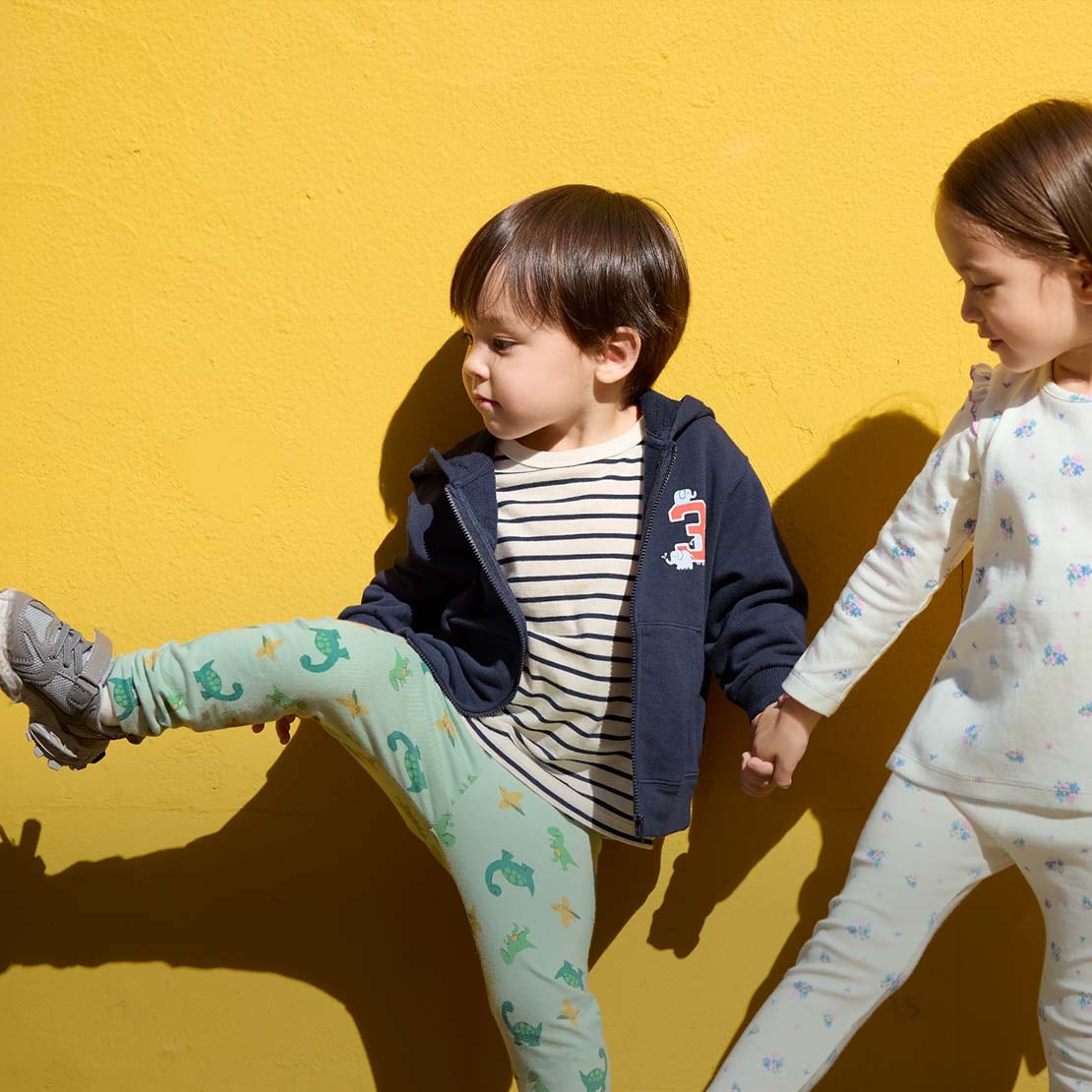 models wearing UNIQLO toddler clothing