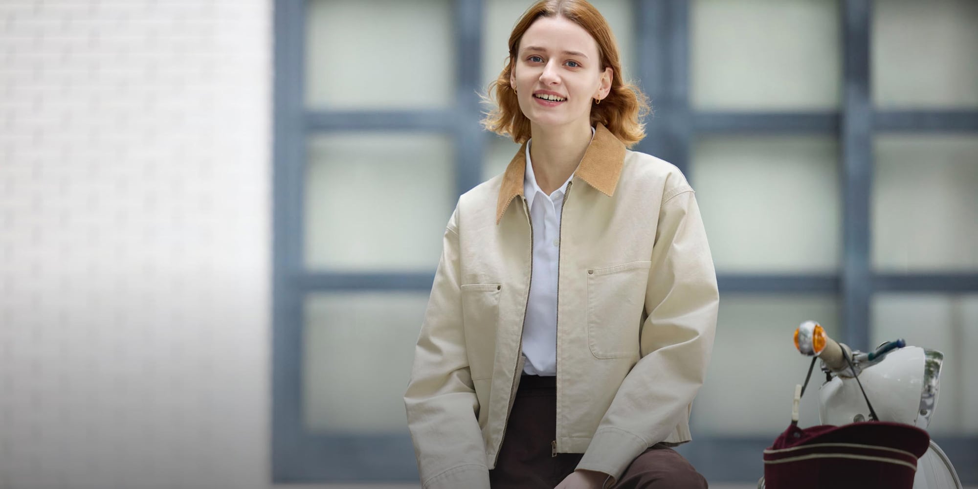 Design details include a checked lining and relaxed fit.