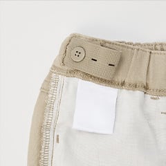 A button on the waistband lets you adjust the fit.