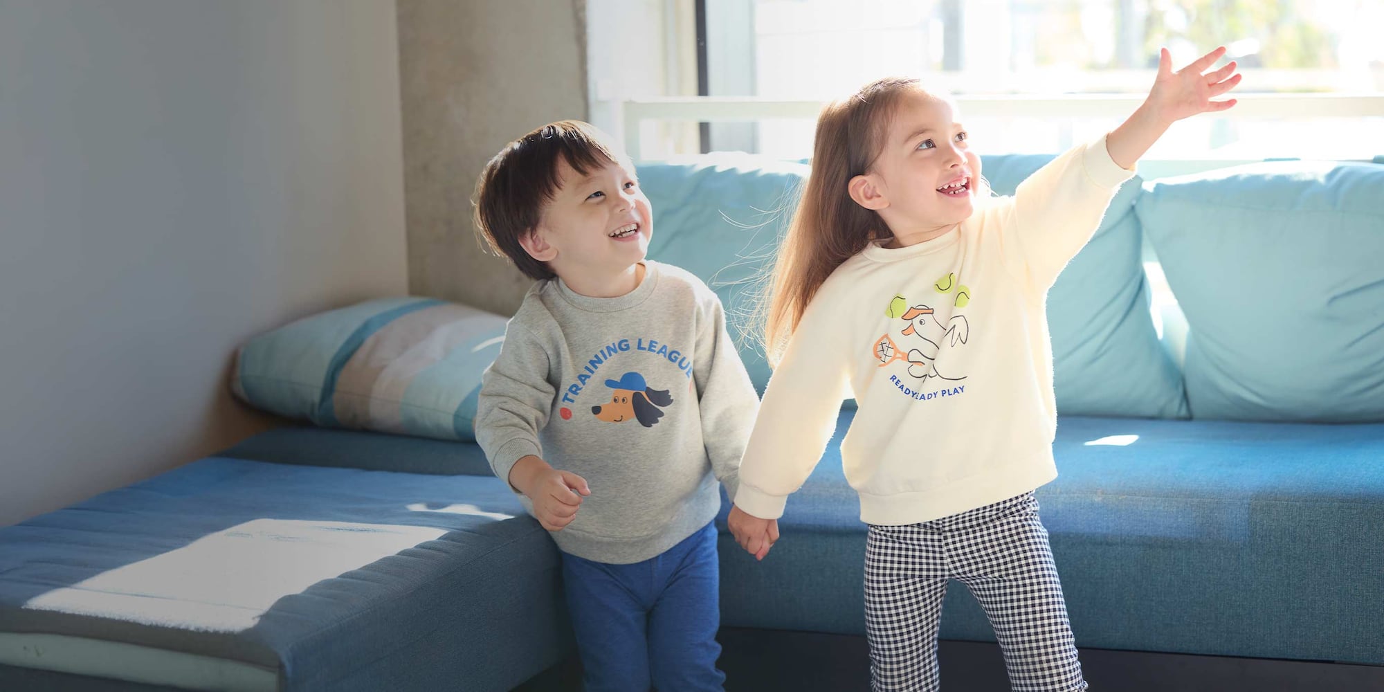 two models wearing Ultra Stretch Sweatshirts