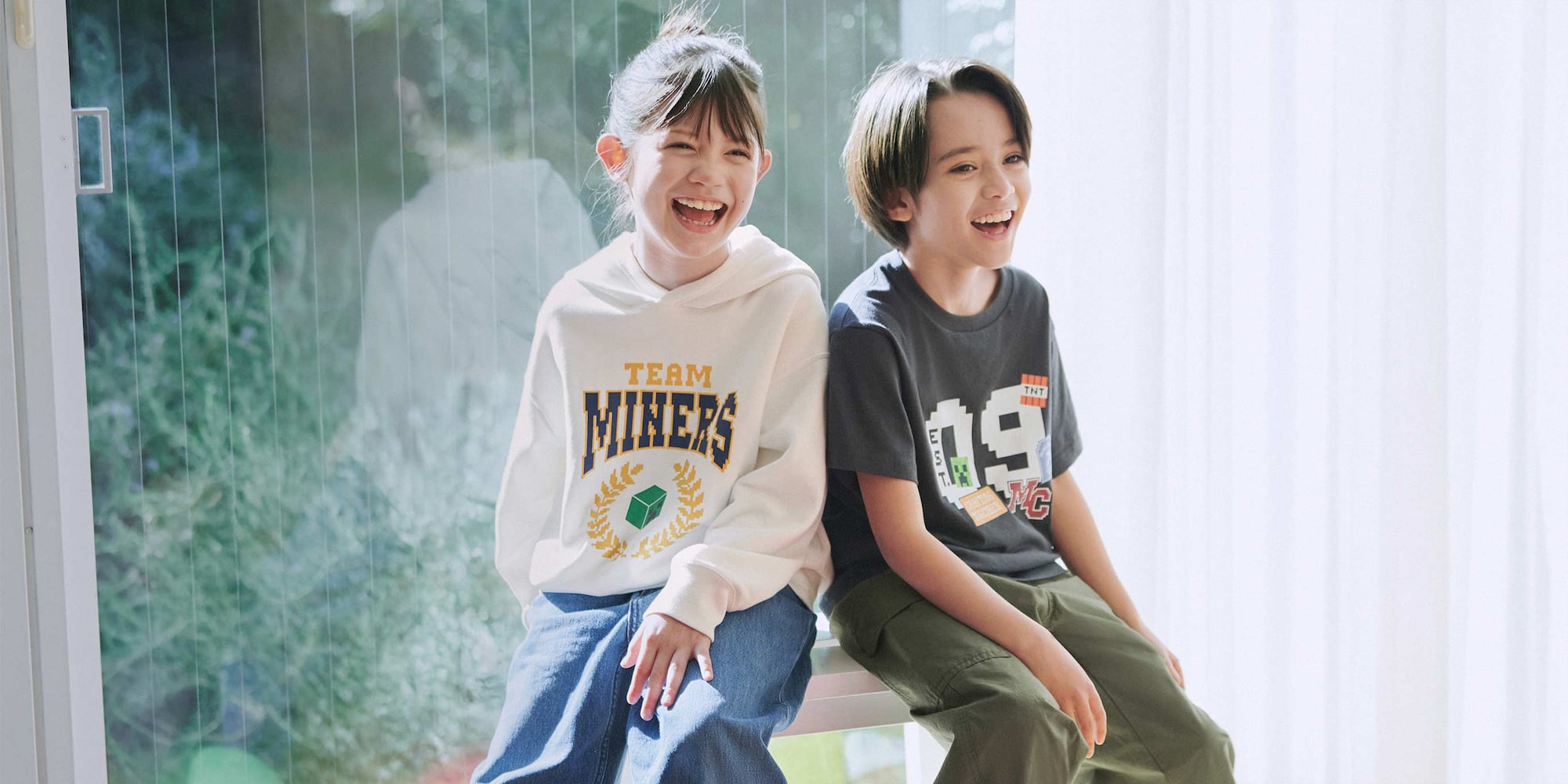 two models wearing Minecraft UT Graphic T-Shirt and hoodie