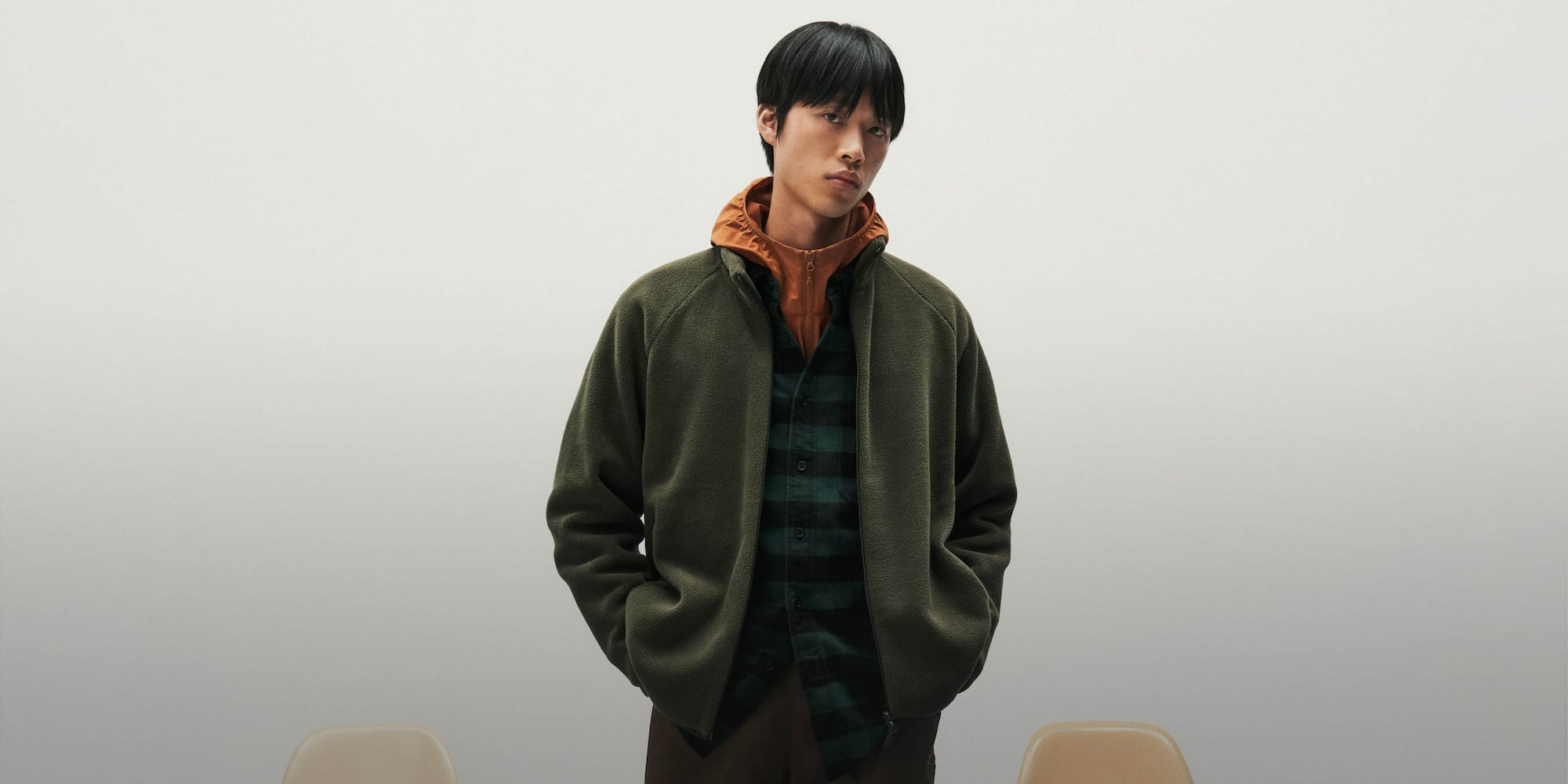 A stand-up collar and piping at the cuffs and hem for extra cold-weather protection.