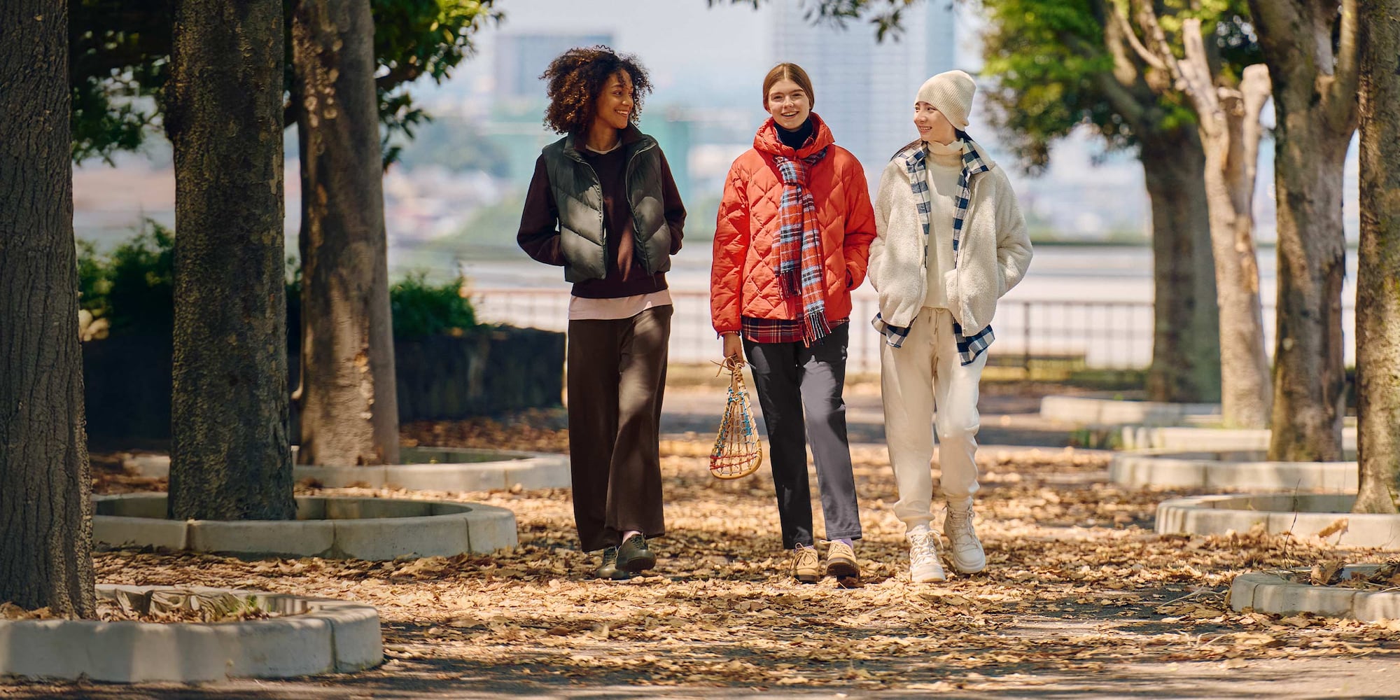 three models wearing UNIQLO warm trousers