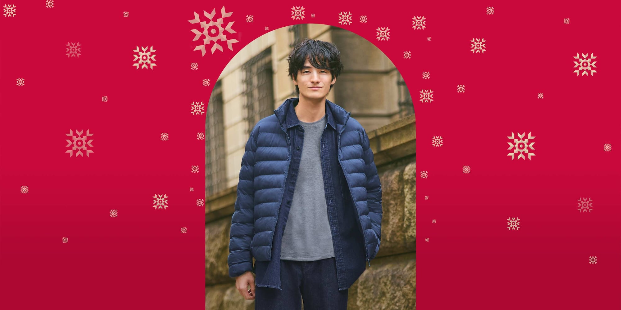 model wearing PUFFERTECH Jacket in blue over a blue shirt, and a grey t-shirt