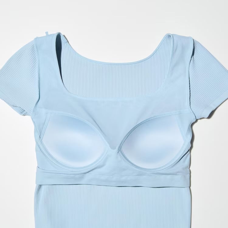 Ultra Stretch fabric with ribbed material. Features flattering neckline in seamless design.