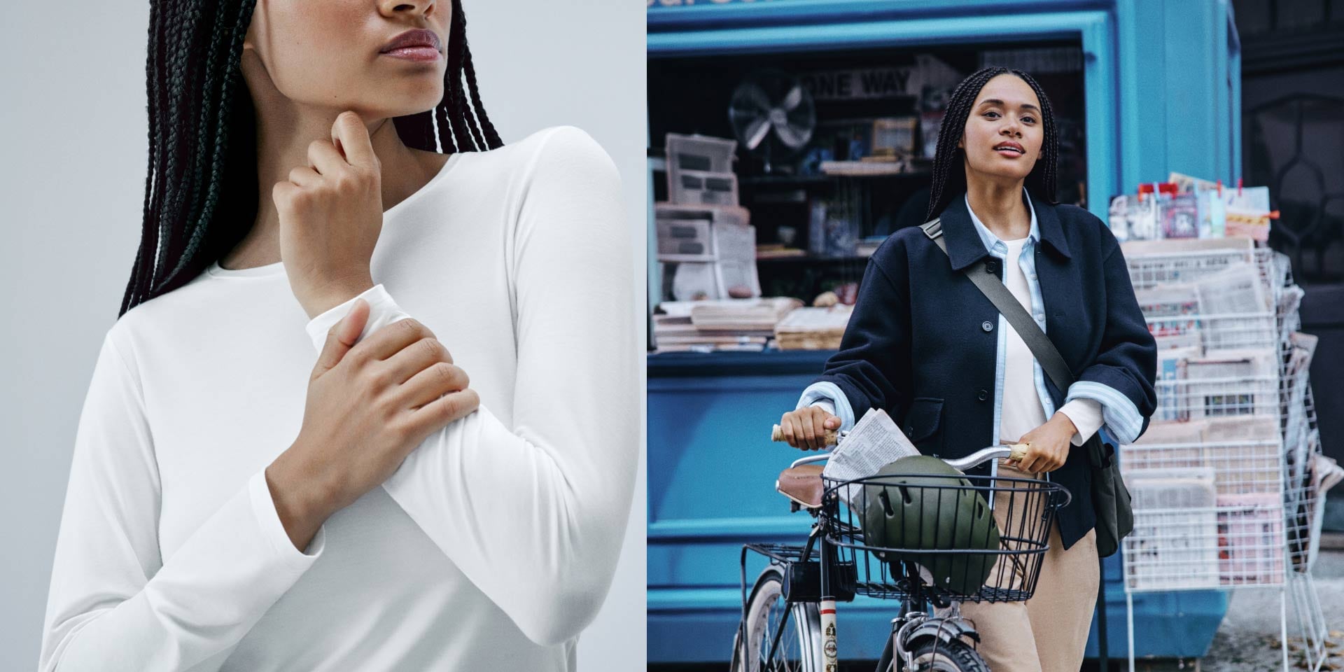 model wearing HEATTECH thermal top in white under a light blue shirt and navy jacket with beige trousers while pushing a bicycle