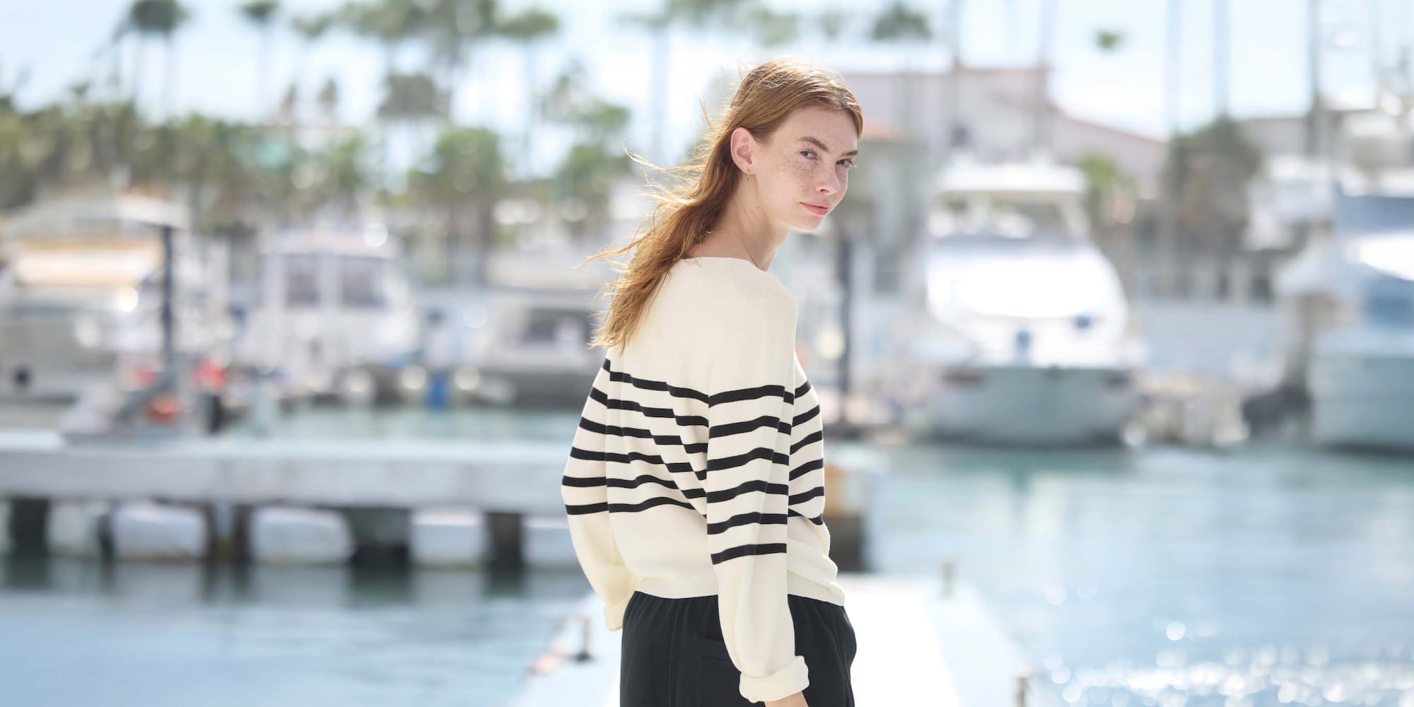 model wearing 3D Knit Seamless Cotton Crew Neck Volume Sleeve Jumper in off white