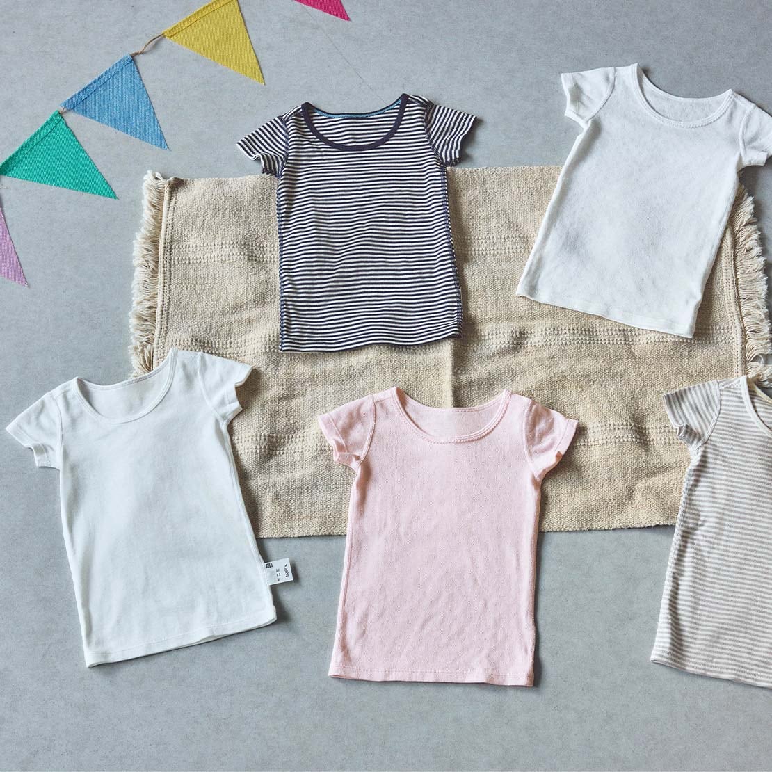 an arrangement of Cotton Ribbed T-Shirts in different styles and colours