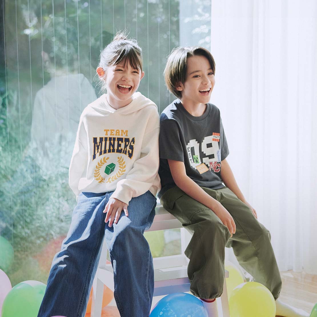two models wearing Minecraft UT Graphic T-Shirt and hoodie