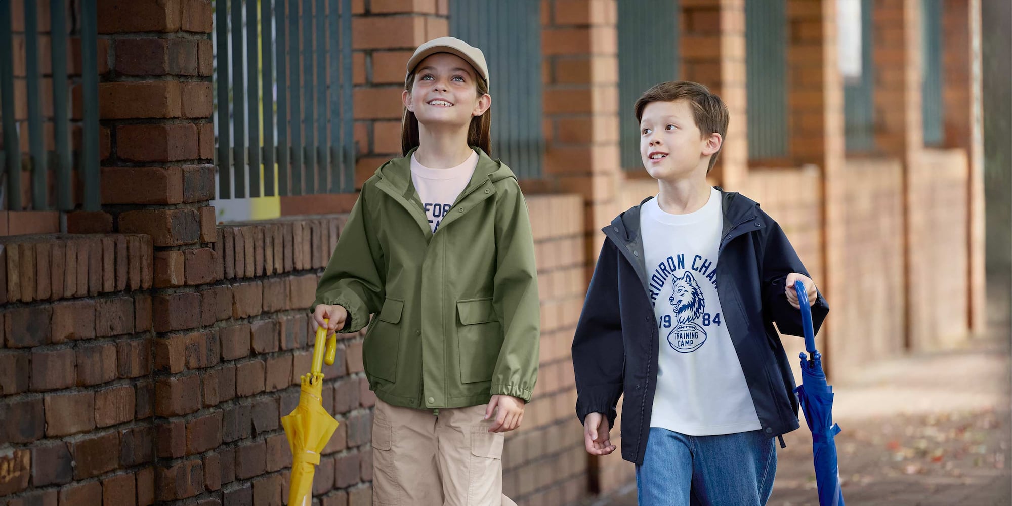 two models wearing BLOCKTECH Parkas in olive and navy
