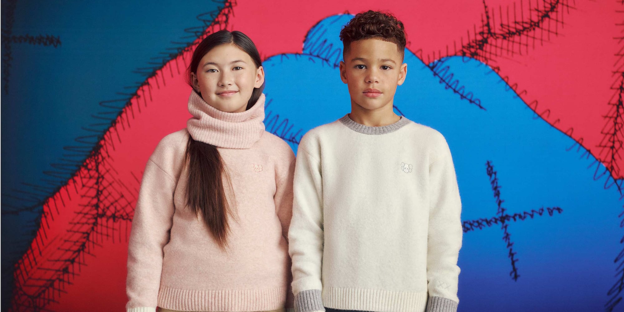 two models wearing KAWS WINTER Soufflé Yarn Jumpers