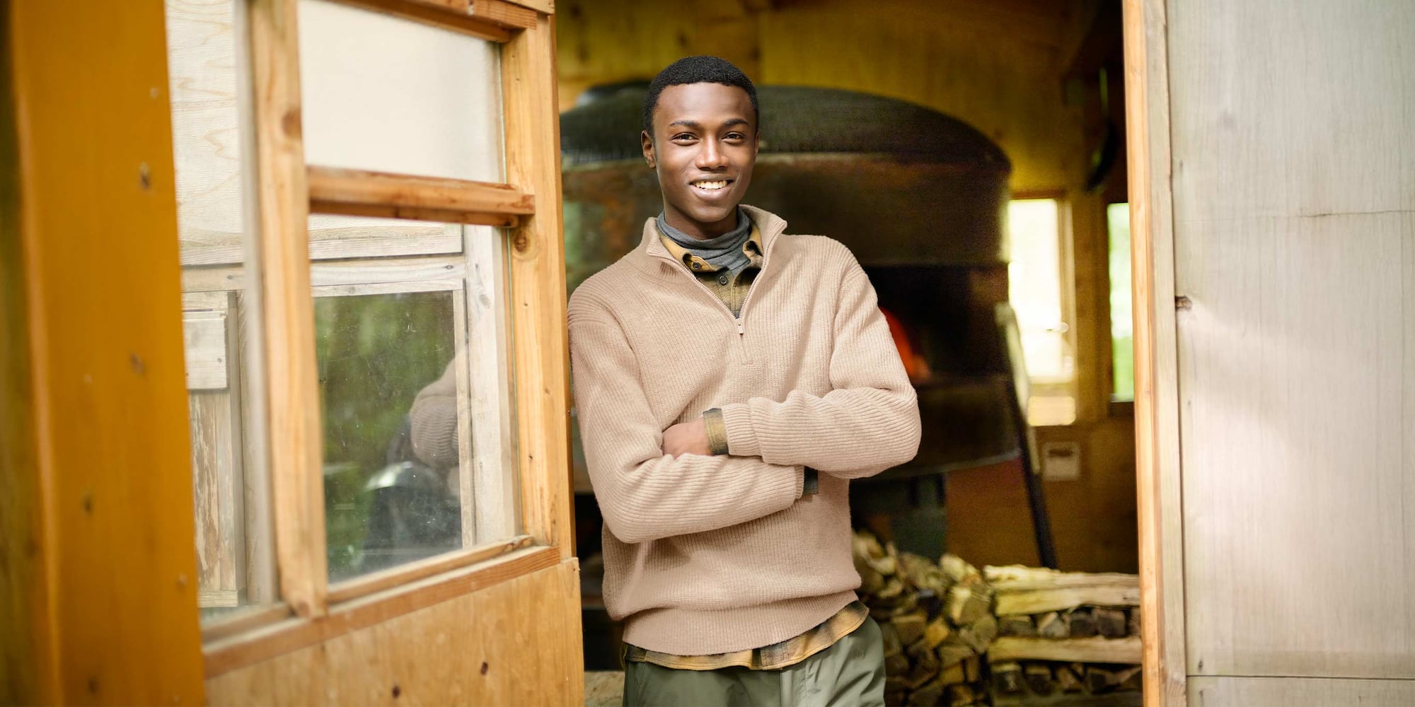 model wearing Soufflé Yarn Half-Zip Jumper in beige over a grey turtleneck and yellow checked shirt