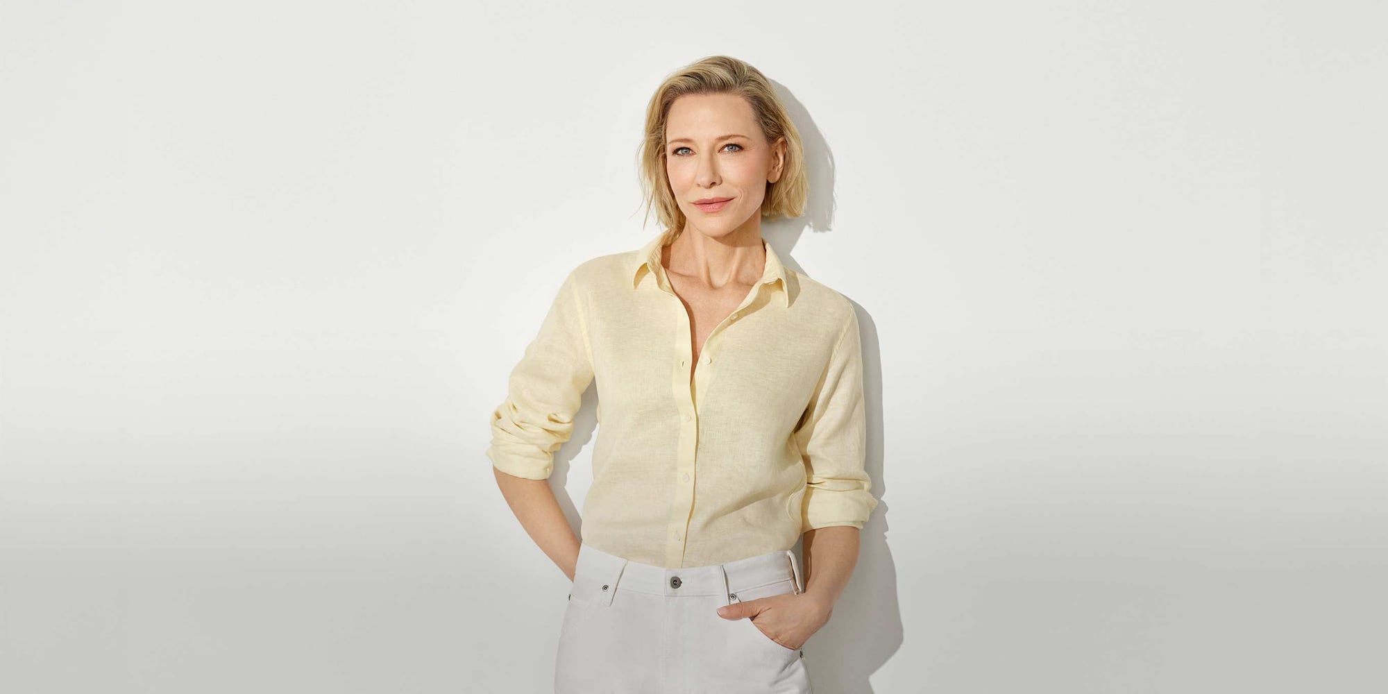 Cate Blanchett wearing 100% Premium Linen Shirt in pale yellow with white jeans