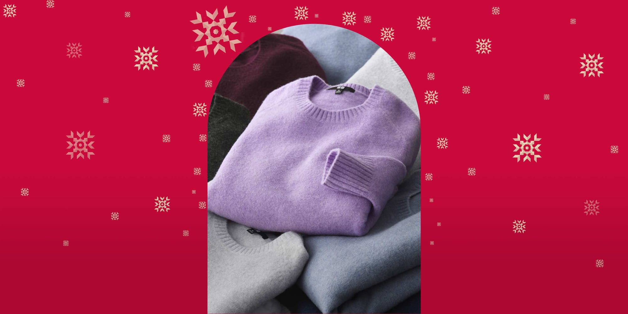 an arrangement of folded Soufflé Yarn Crew Neck Jumpers in different colours