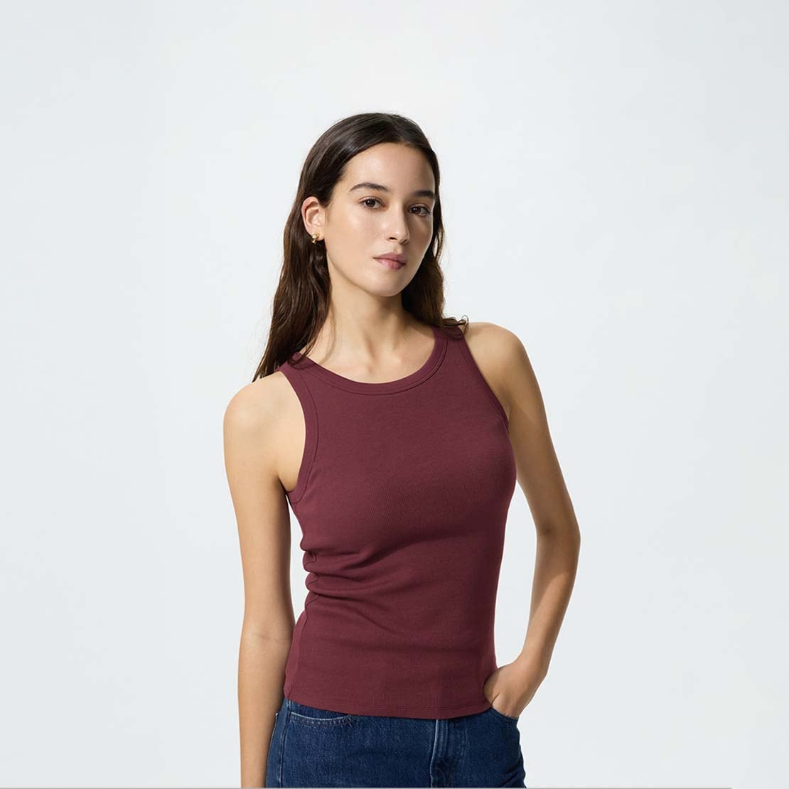 model wearing Ribbed Bra Top (Regular Length) in wine with dark wash jeans
