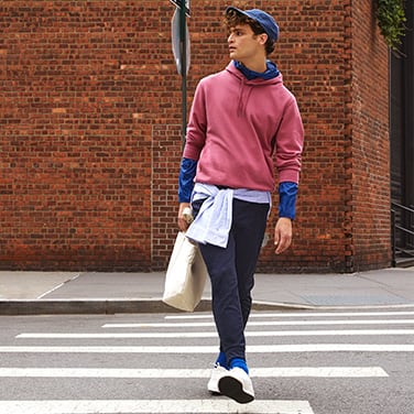 A sweat hoodie with a relaxed fit is easy to layer.