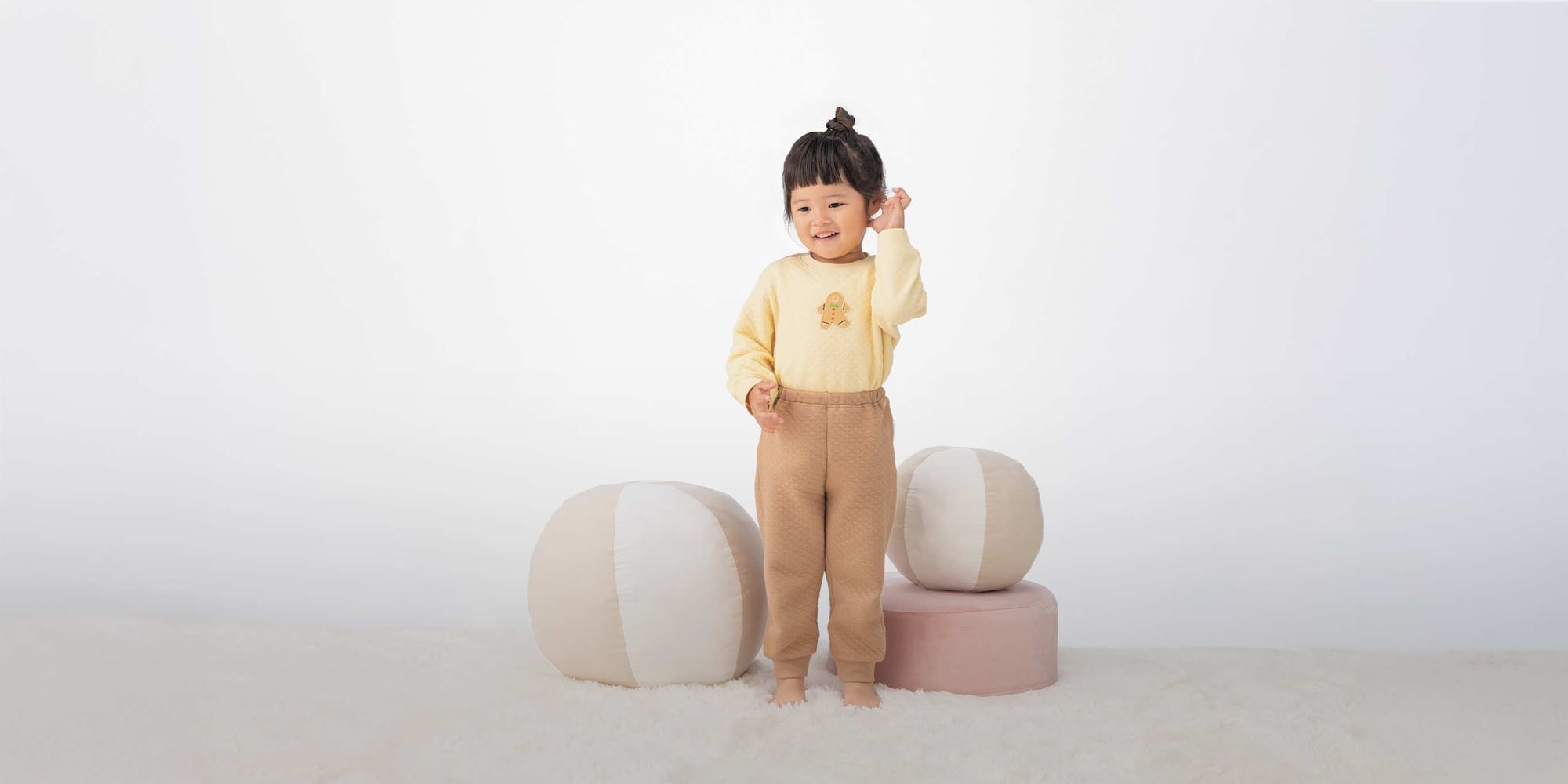 model wearing Quilted Pyjamas in yellow