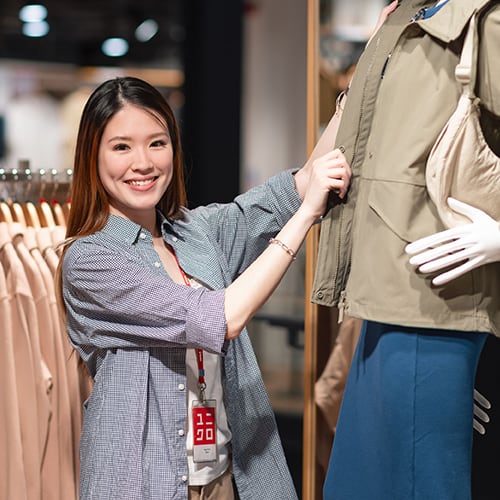 Visual merchandiser on the UNIQLO shop floor