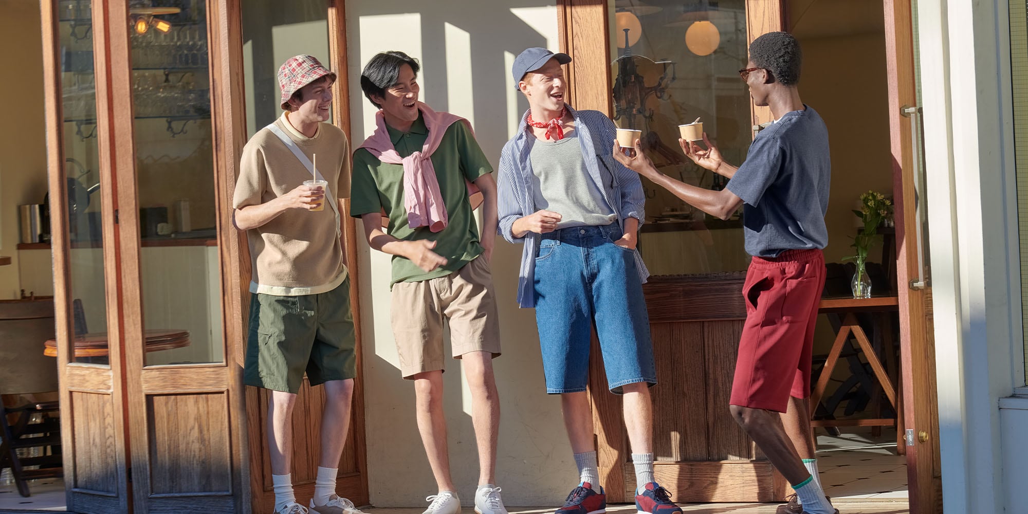 four models wearing UNIQLO shorts