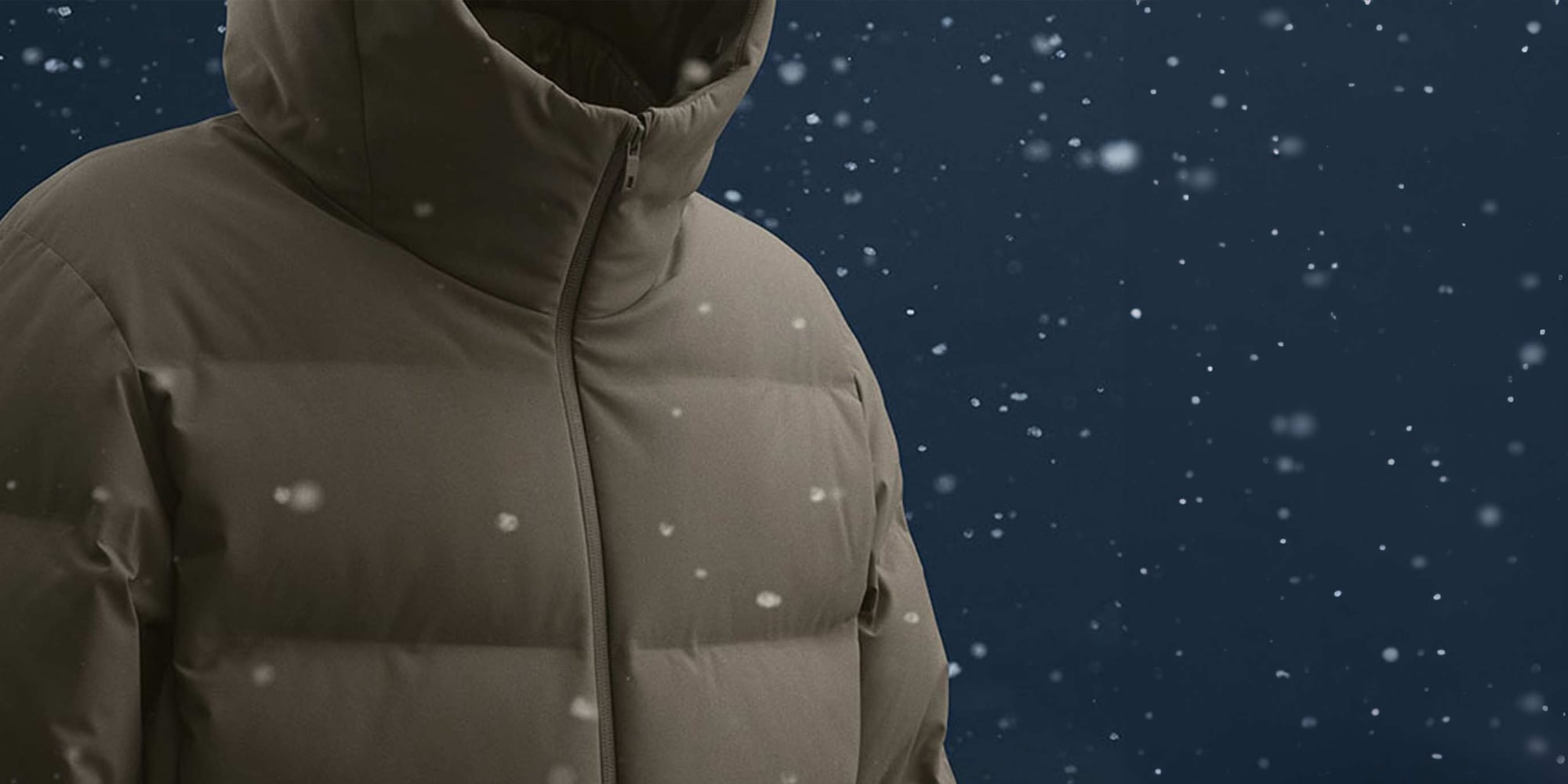 a close-up shot of a Seamless Down Parka fending off water droplets