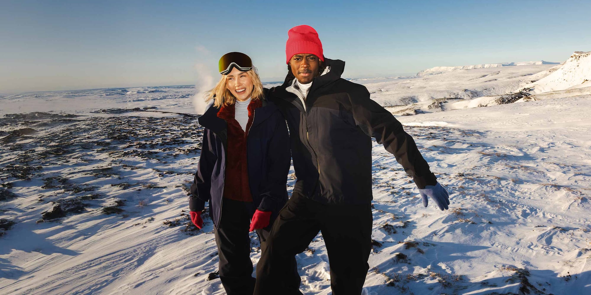 two models wearing UNIQLO x Sweden Athlete Collection skiwear