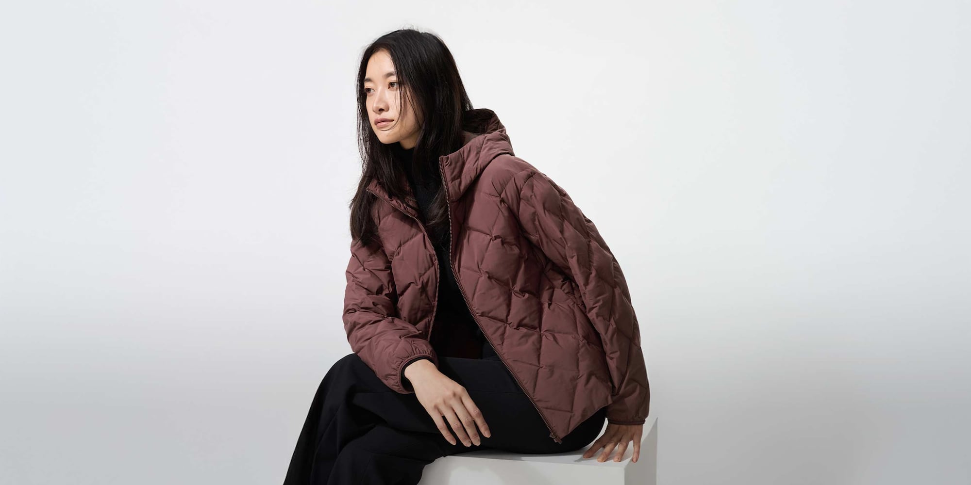 model wearing PUFFERTECH parka in wine